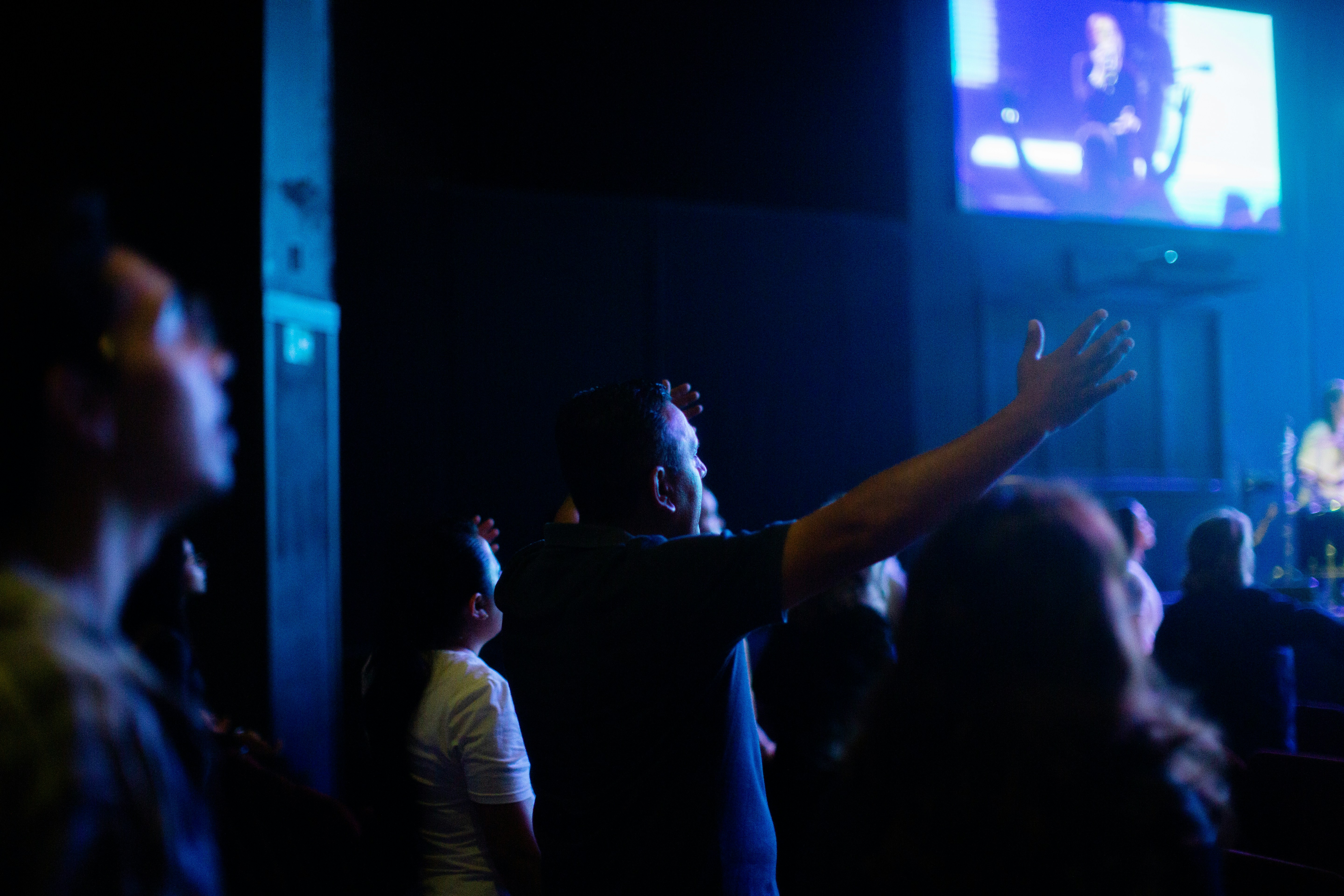 A crowd of people standing around a stage