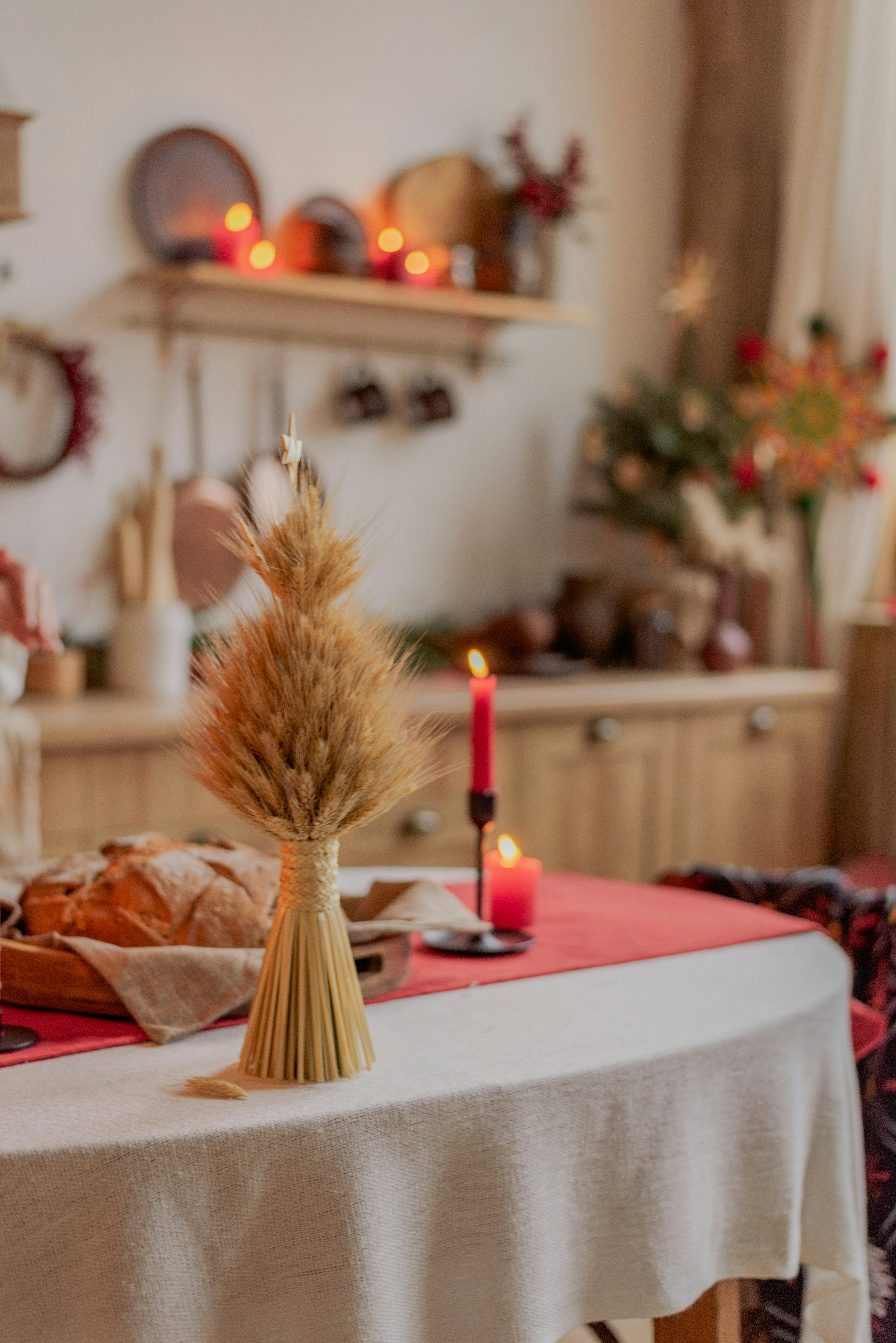 A table with a white table cloth and a red table cloth