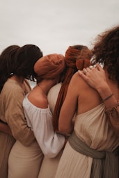 A group of women standing next to each other