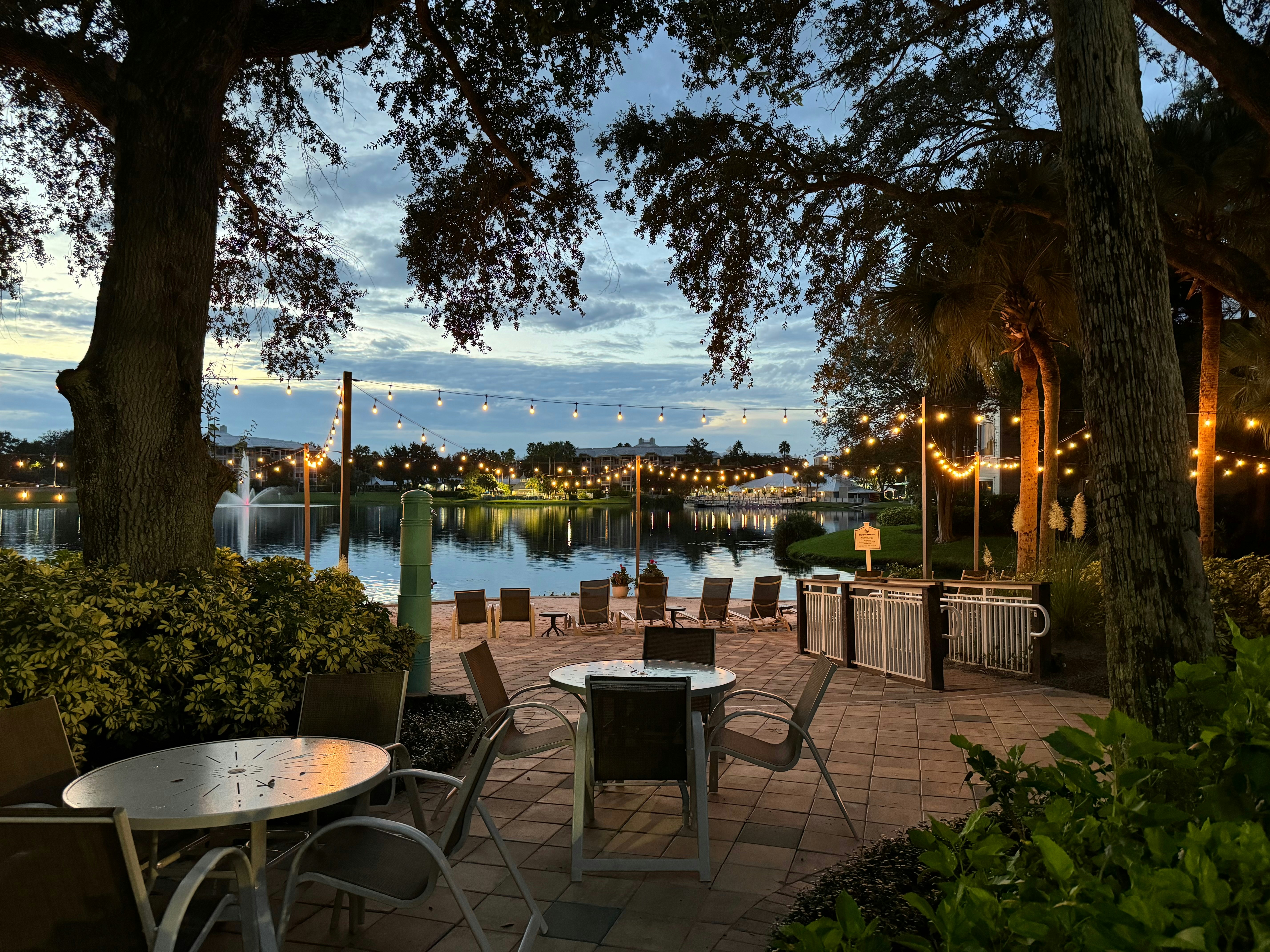 Open patio near lake with no screening, exposed to mosquitoes and insects in summer