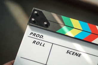 A close up of a movie clapper