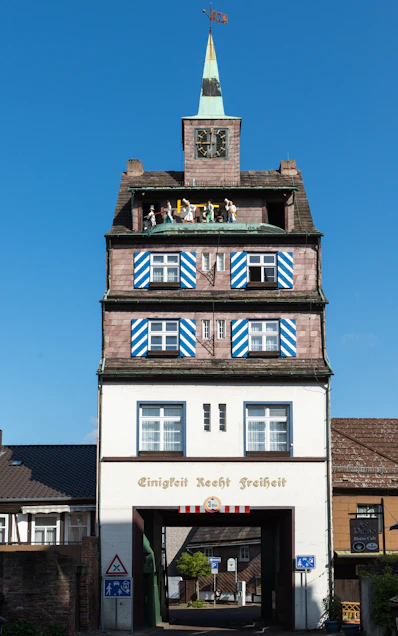 A tall building with a clock on the top of it