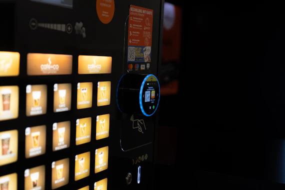 A vending machine is lit up at night