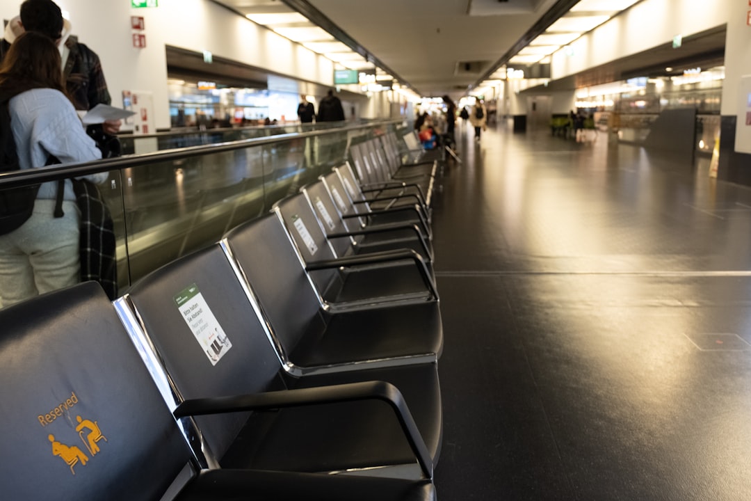 A row of empty seats in an airport,
