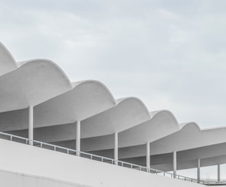 A man riding a skateboard on top of a ramp