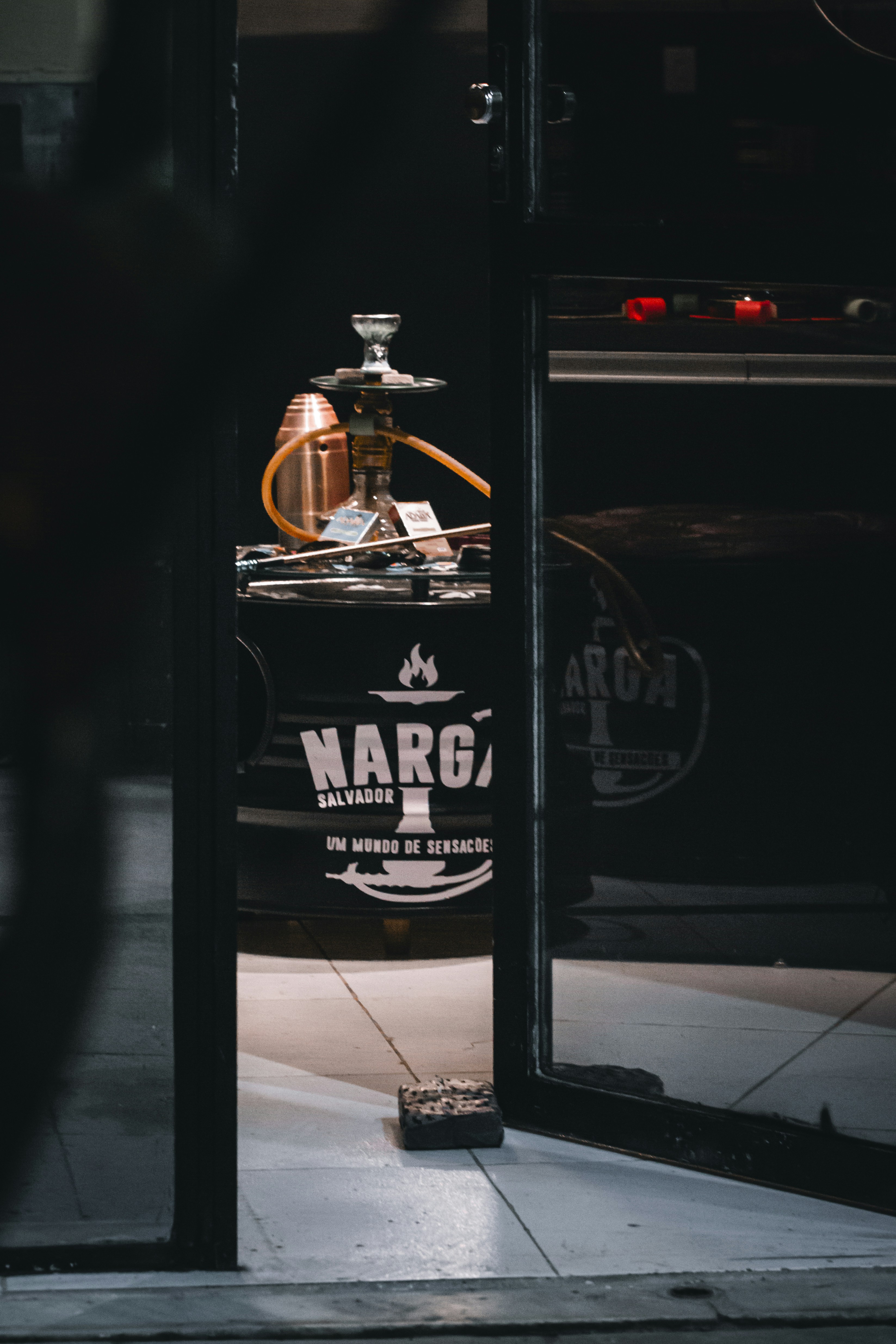A coffee machine sitting outside of a building
