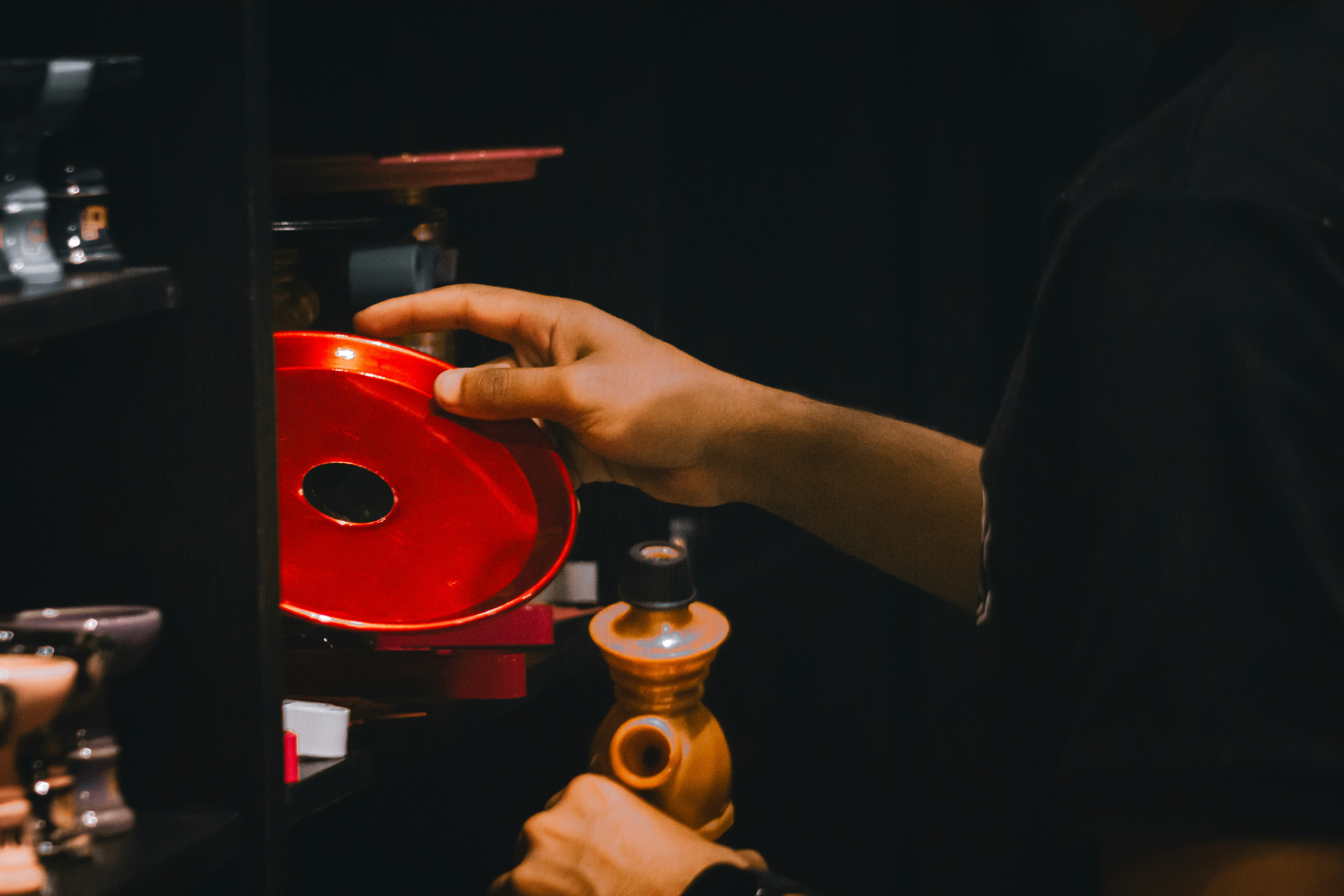 A man is working on a machine in a shop