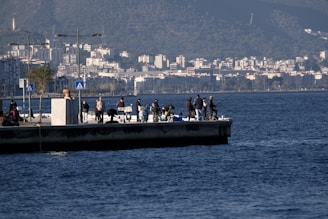 A group of people on a boat in the water