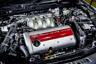A picture of a car engine with its hood open