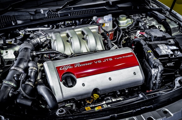 A picture of a car engine with its hood open