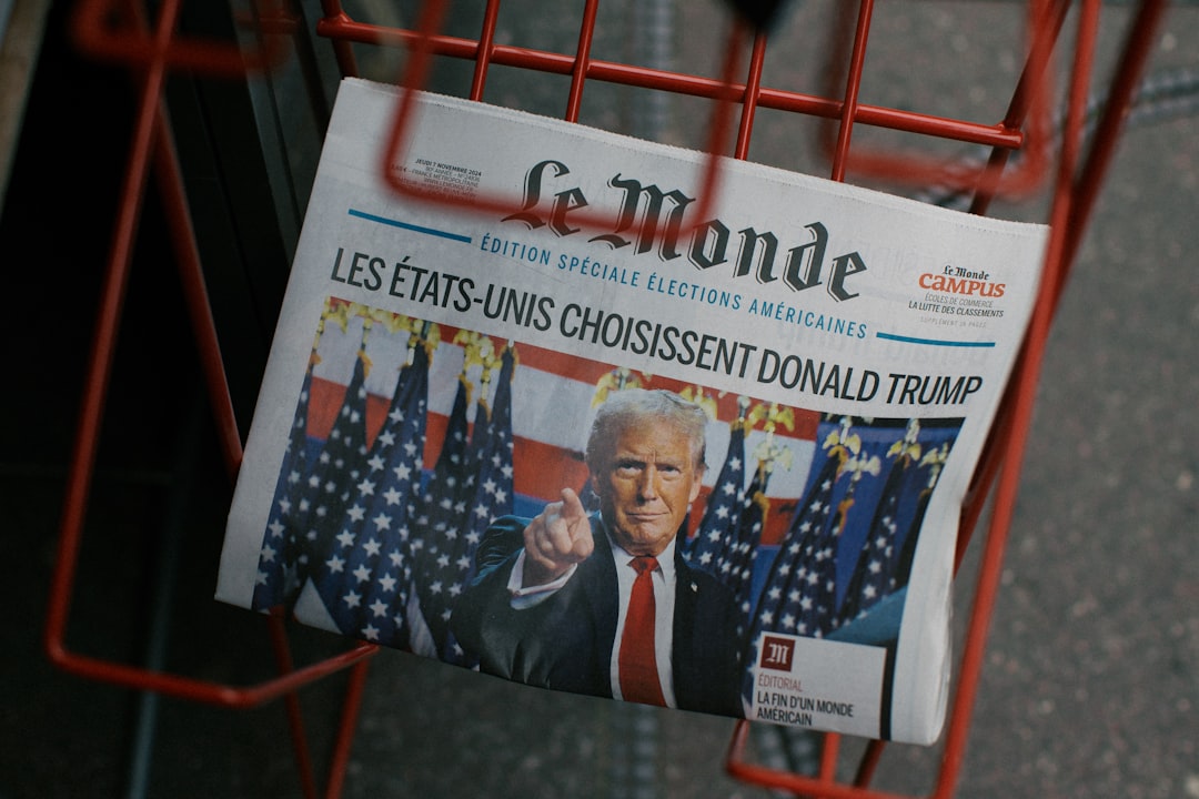 A newspaper sitting in a red shopping cart