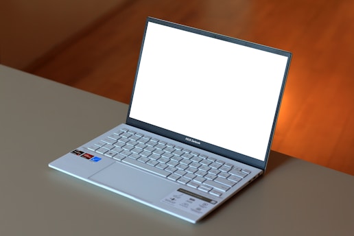 A laptop computer sitting on top of a table