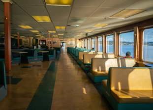 A train car with lots of seats and windows