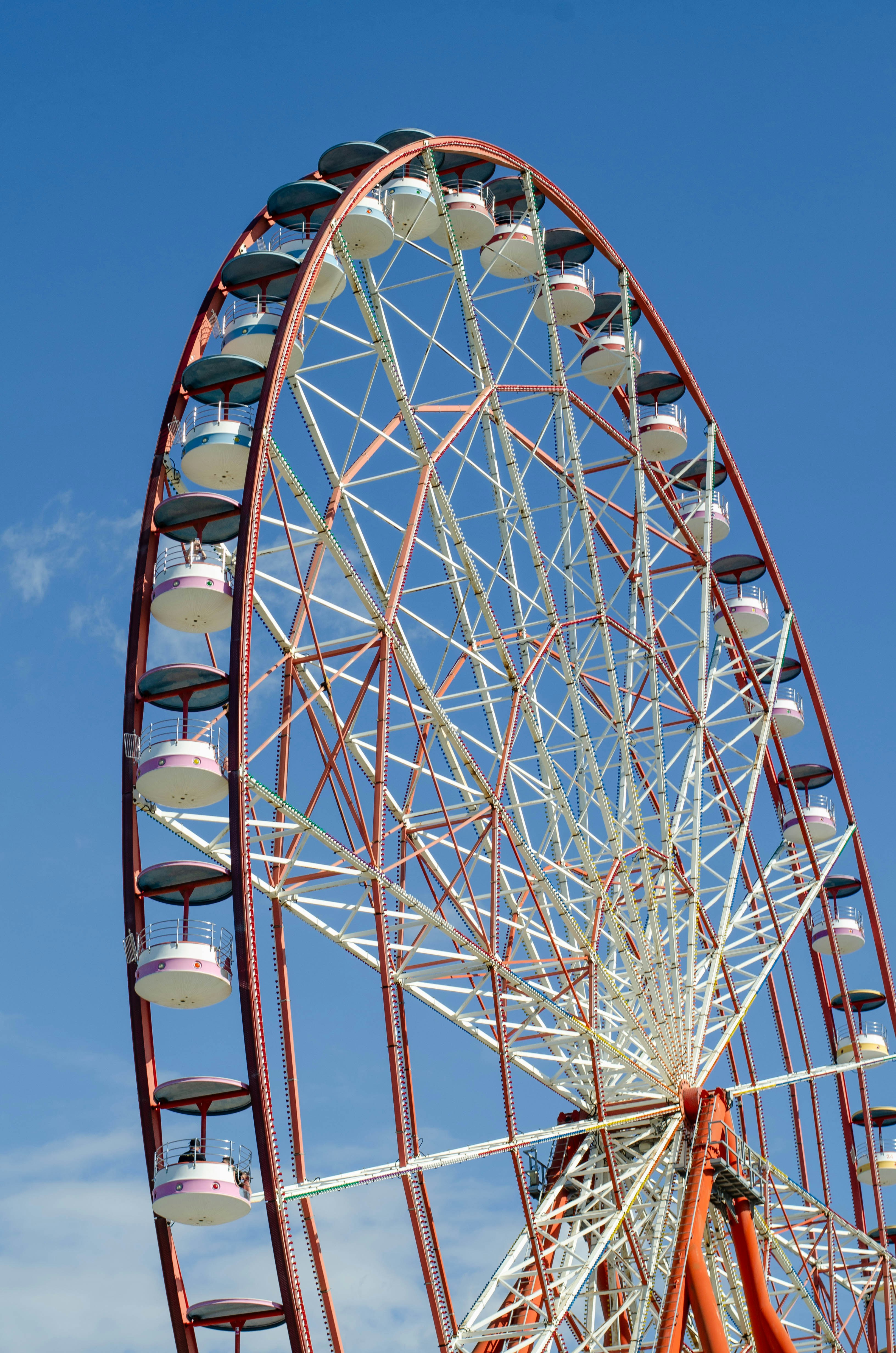 A large ferris wheel on a clear day