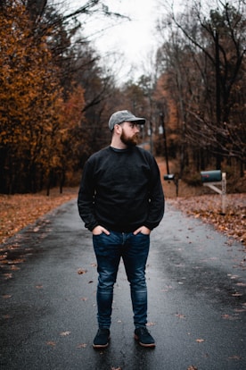A man standing in the middle of a road