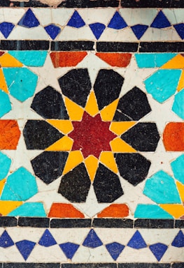 A close up of a colorful tile wall