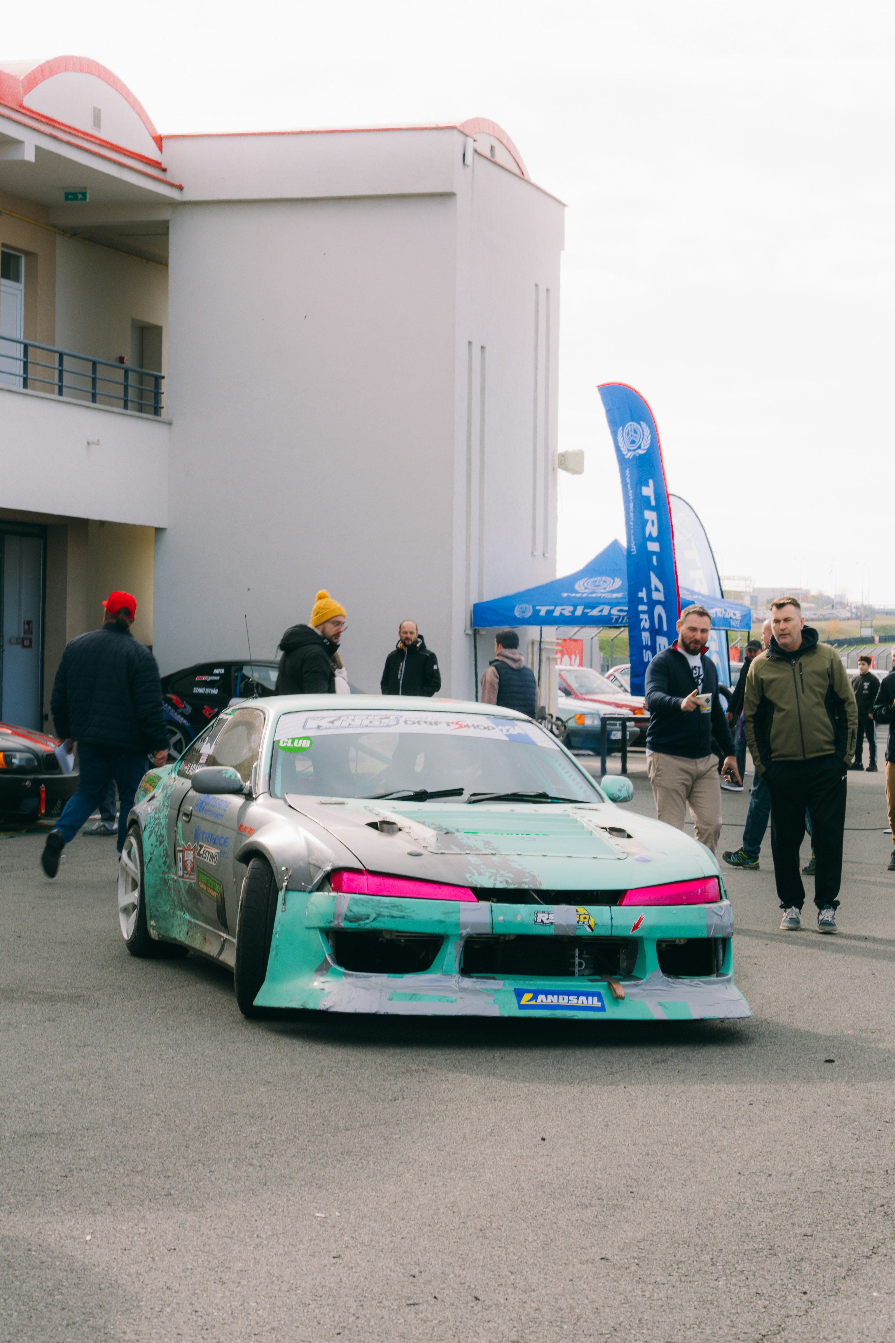 A car parked in front of a building