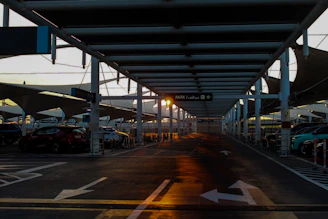 A view of an empty parking lot at sunset