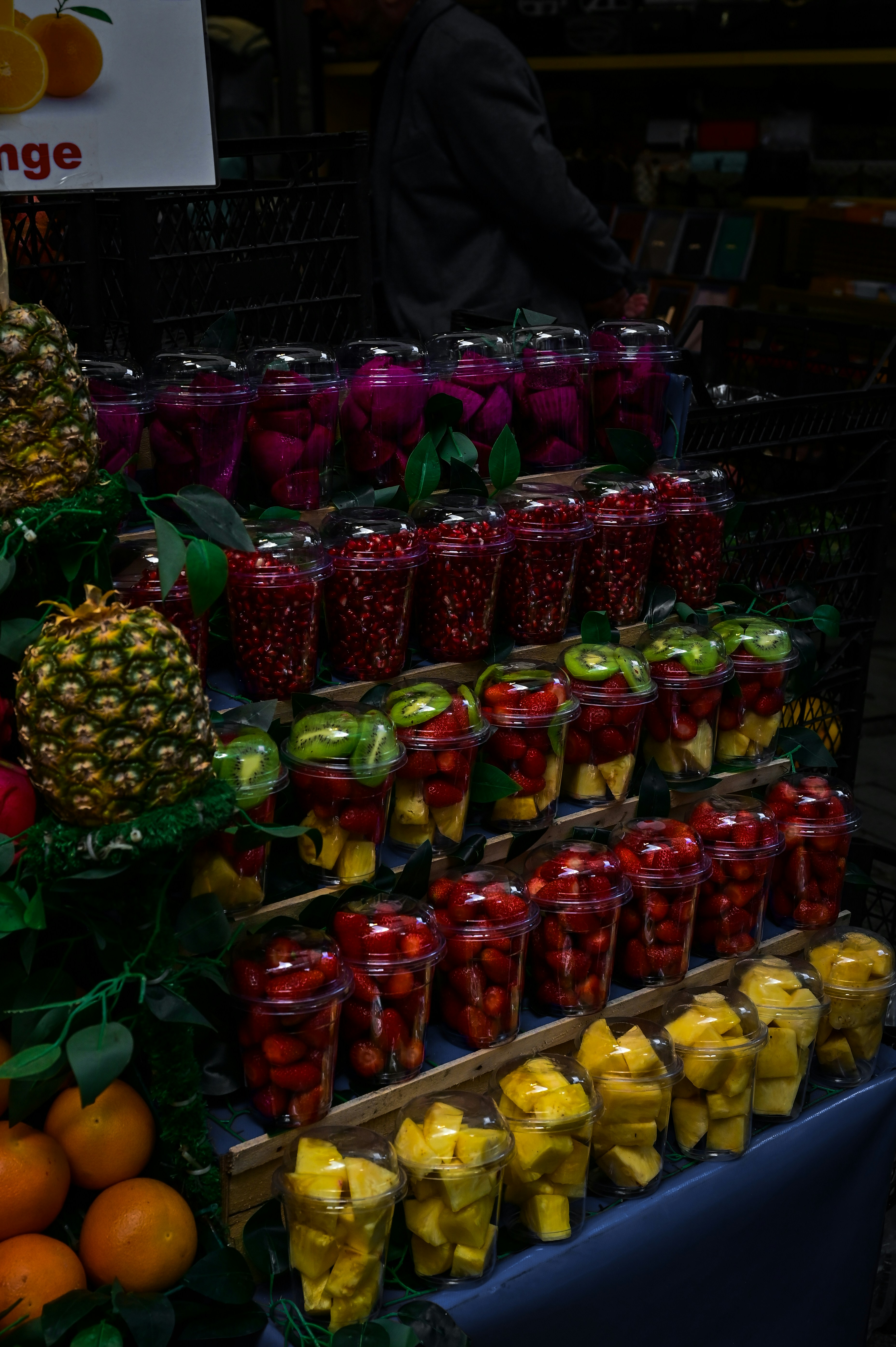 A fruit stand with many different types of fruit