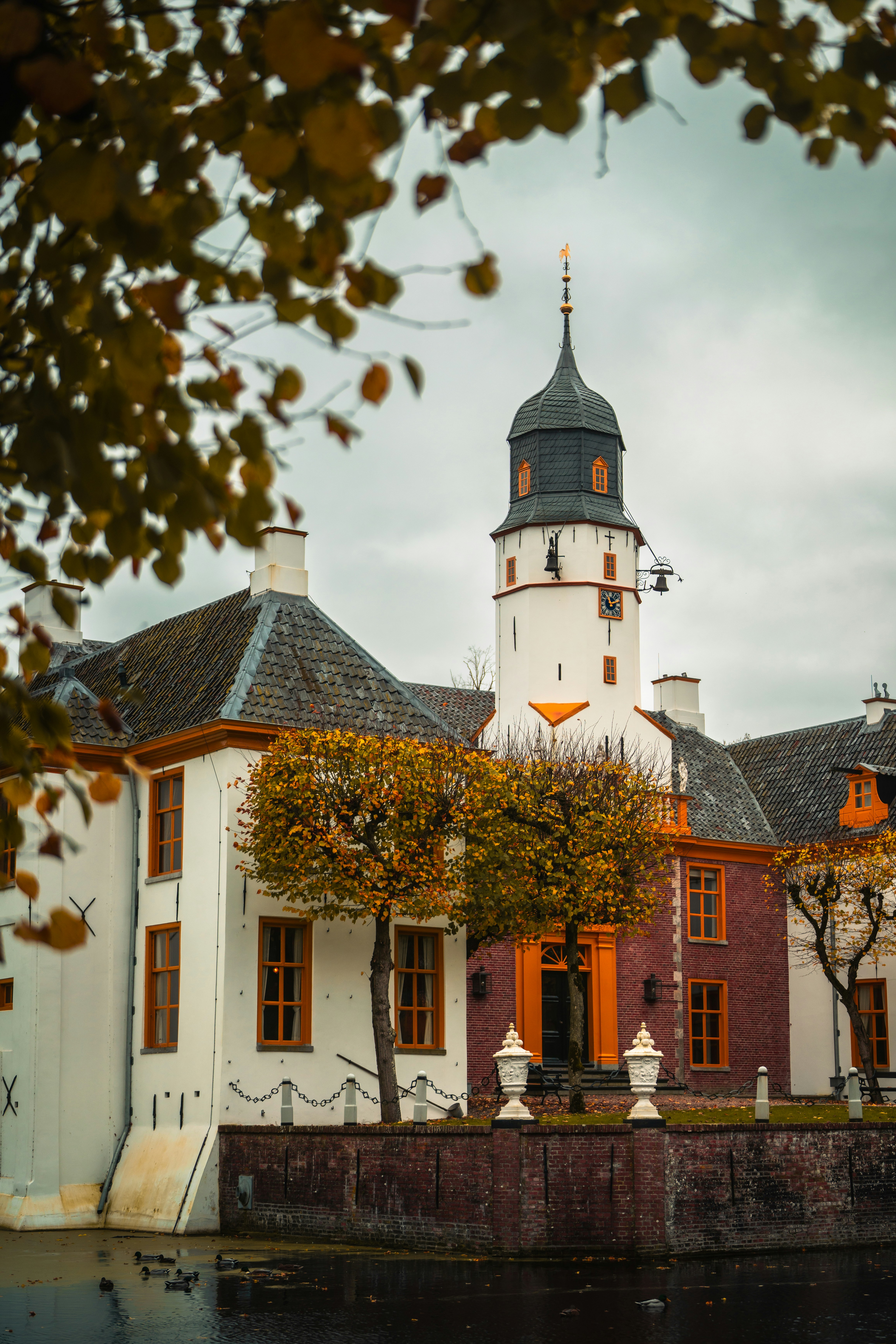A large white building with a clock tower