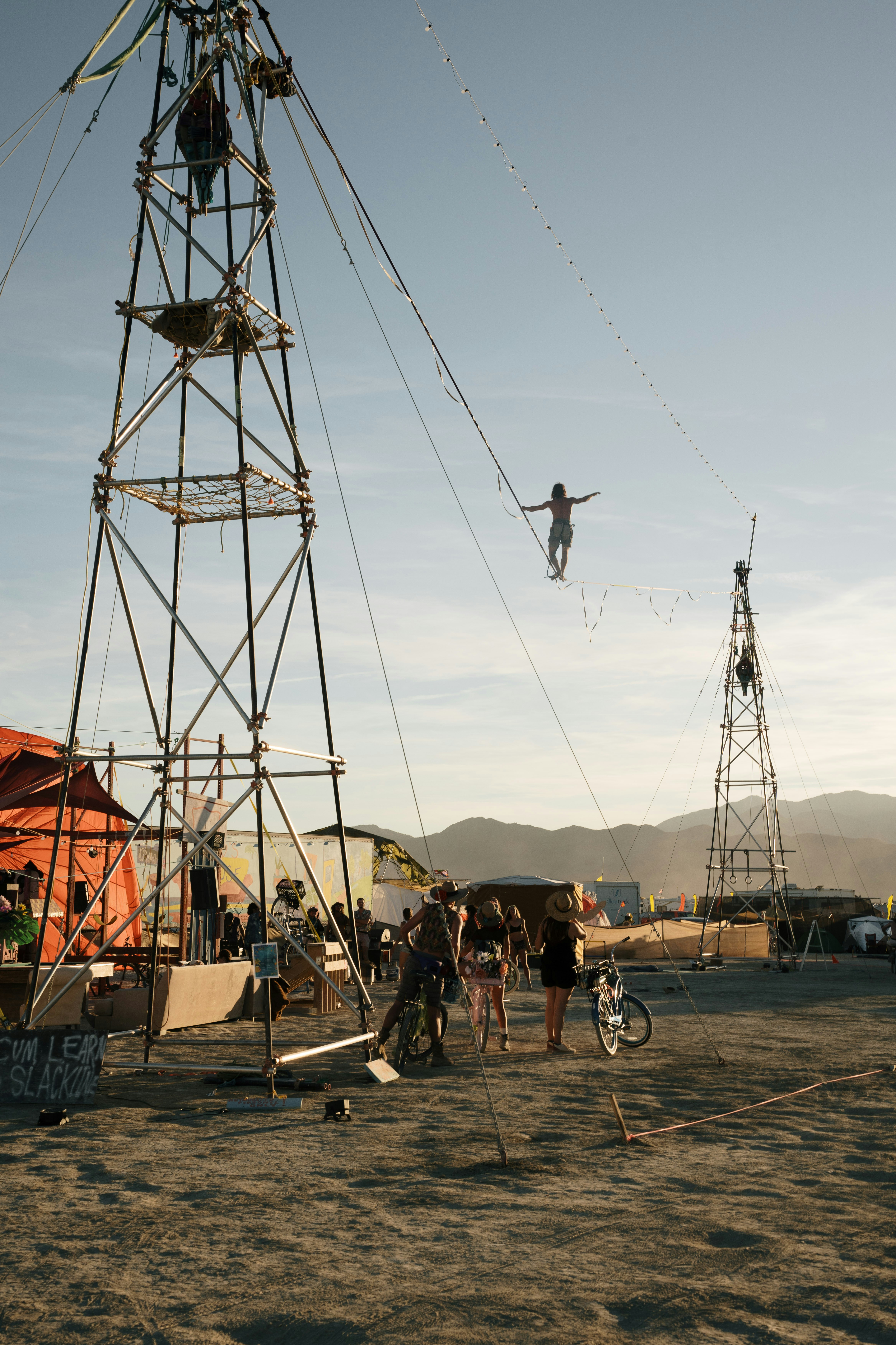 A man flying through the air while riding a kiteboard
