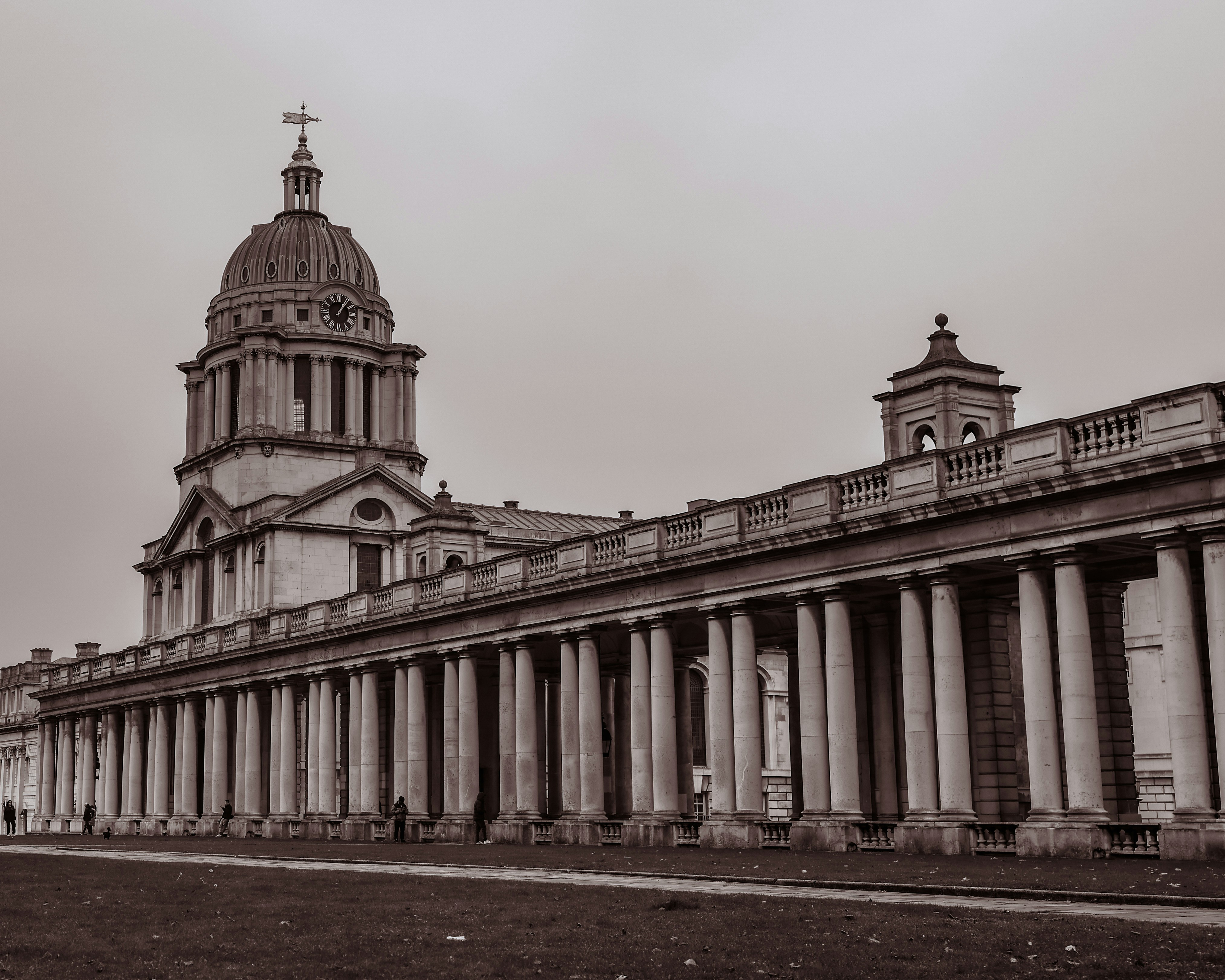 A black and white photo of a large building