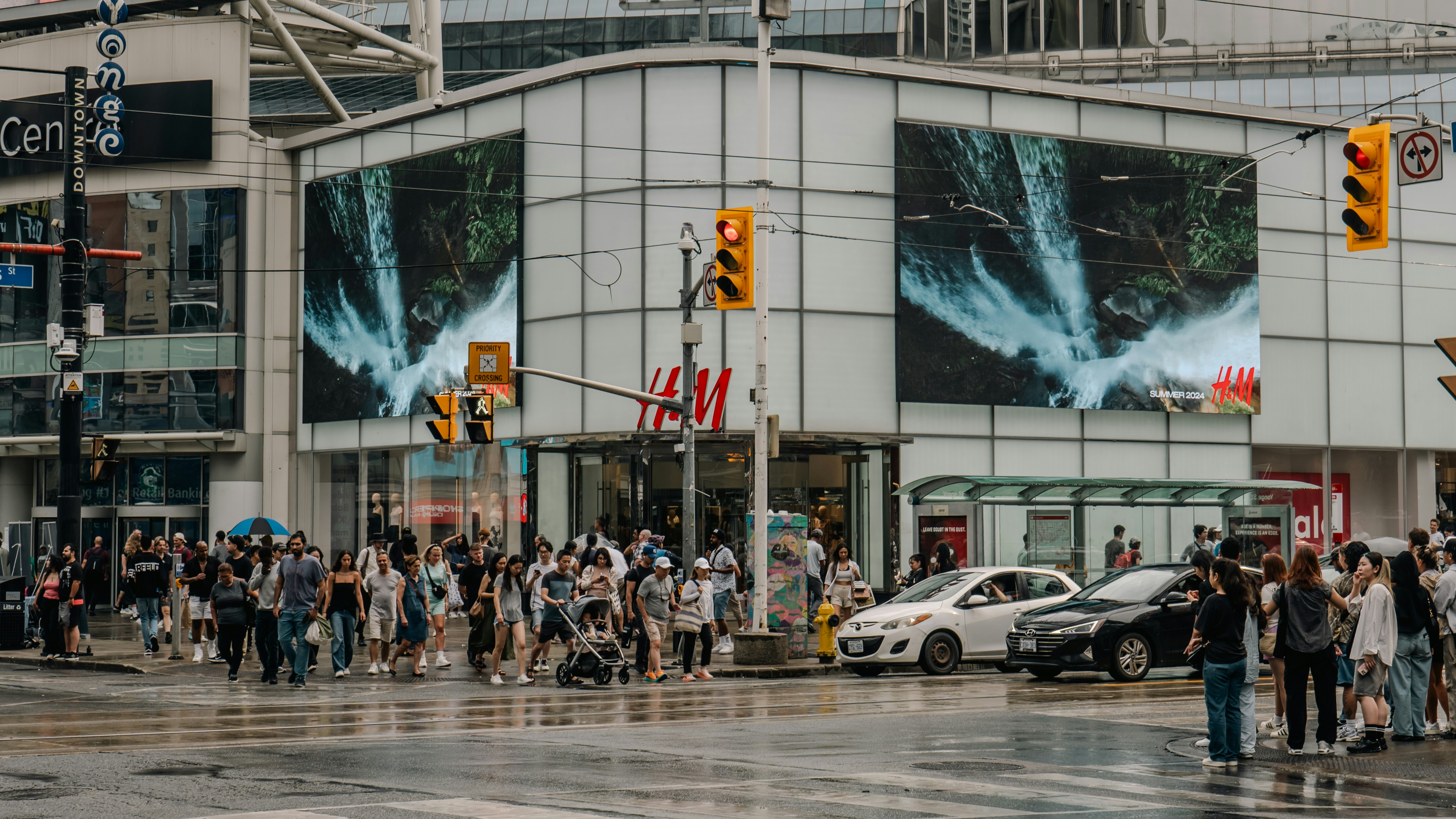 A large group of people standing in front of a building