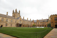A large building with a lawn in front of it