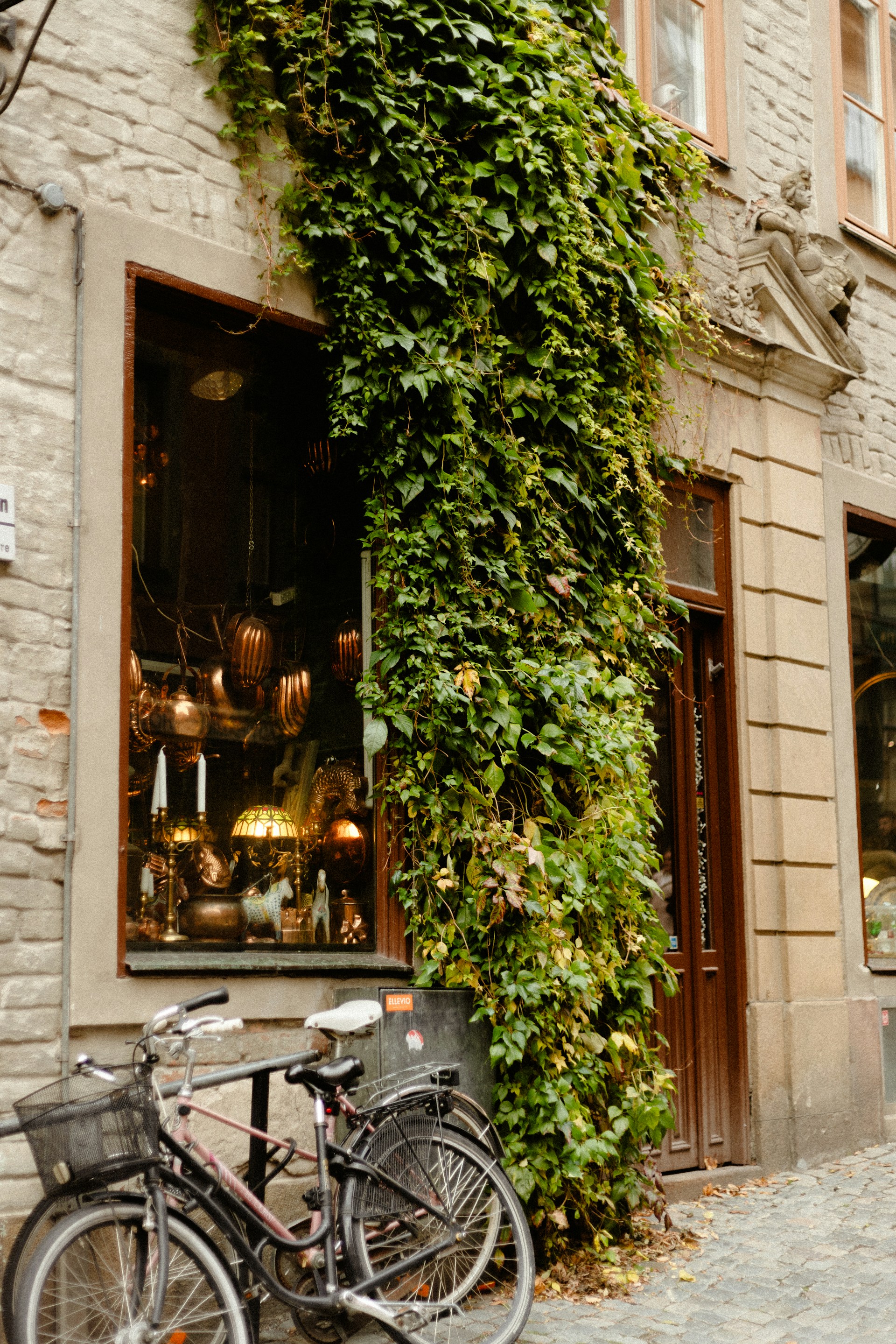 A bicycle parked in front of a building