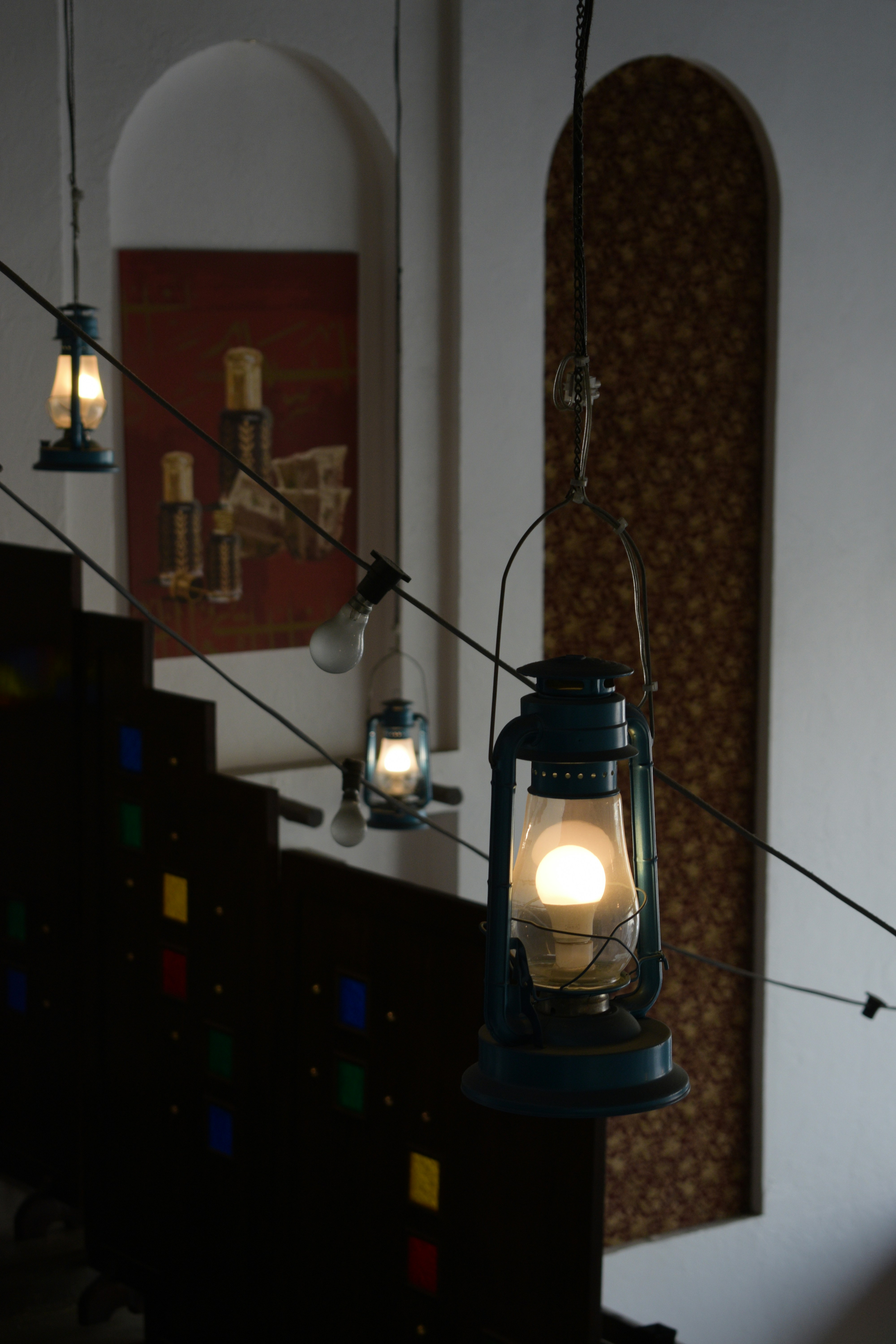 A group of lights hanging from a ceiling