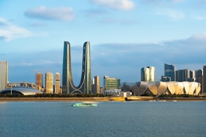 A large body of water with a city in the background