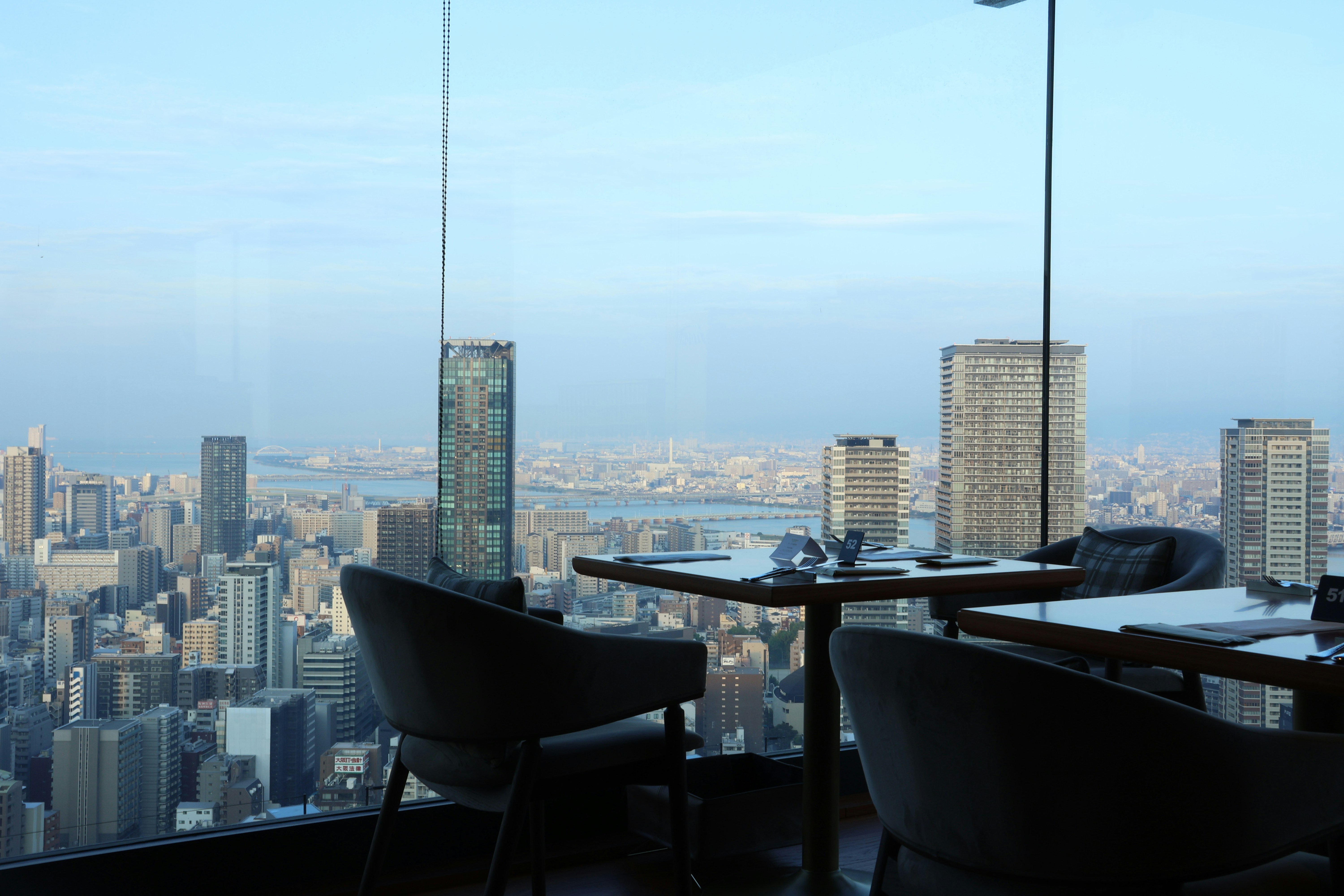 revolving restaurant with city skyline views - crazy places to eat