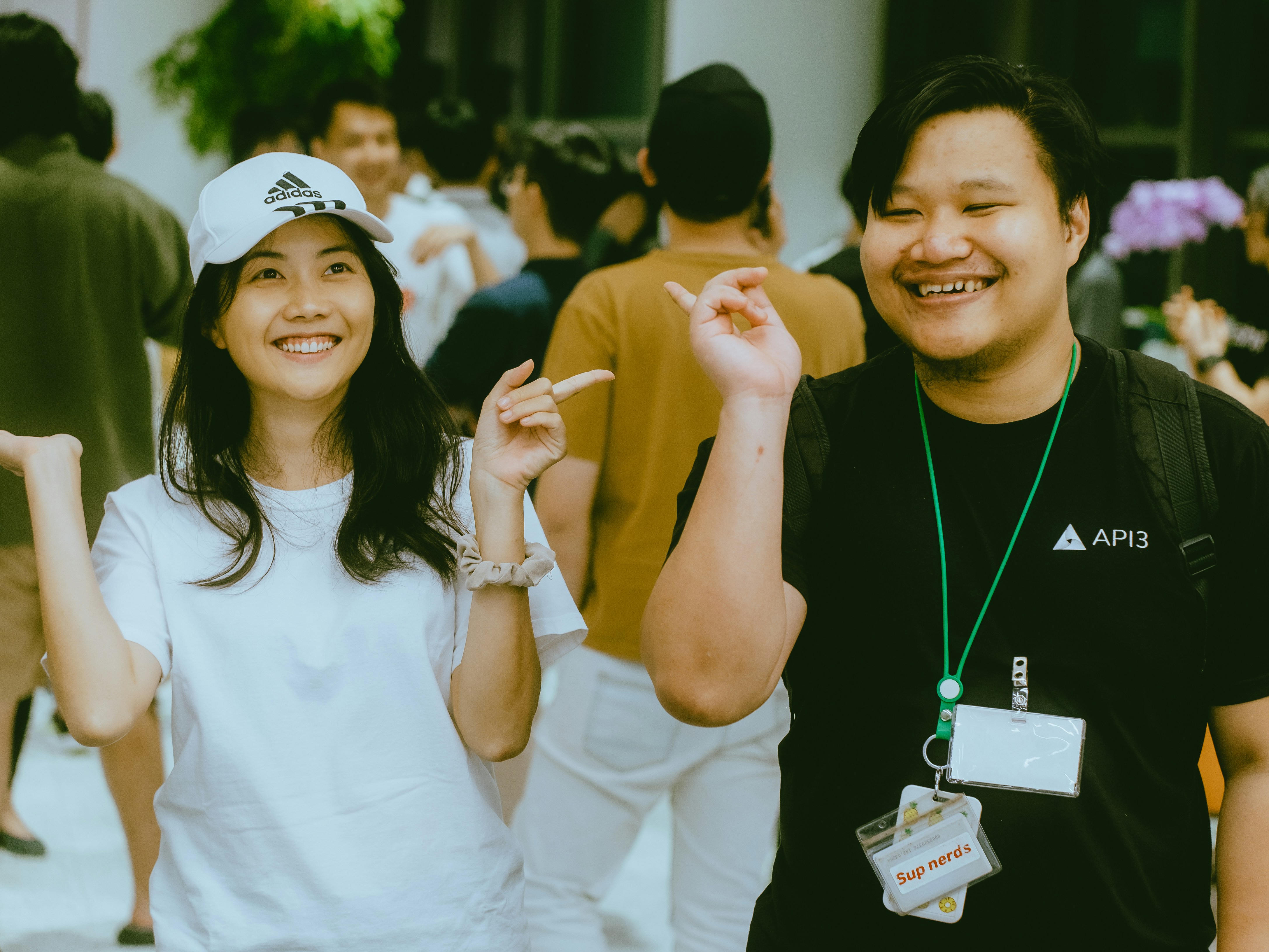 A couple of people standing next to each other