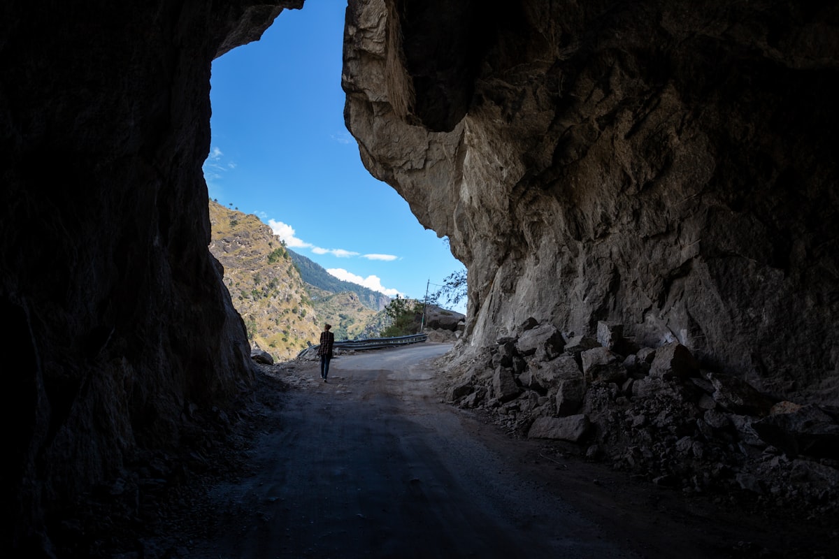 Mountain road cut through rock on the Tawang-Bomdila-Dirang route