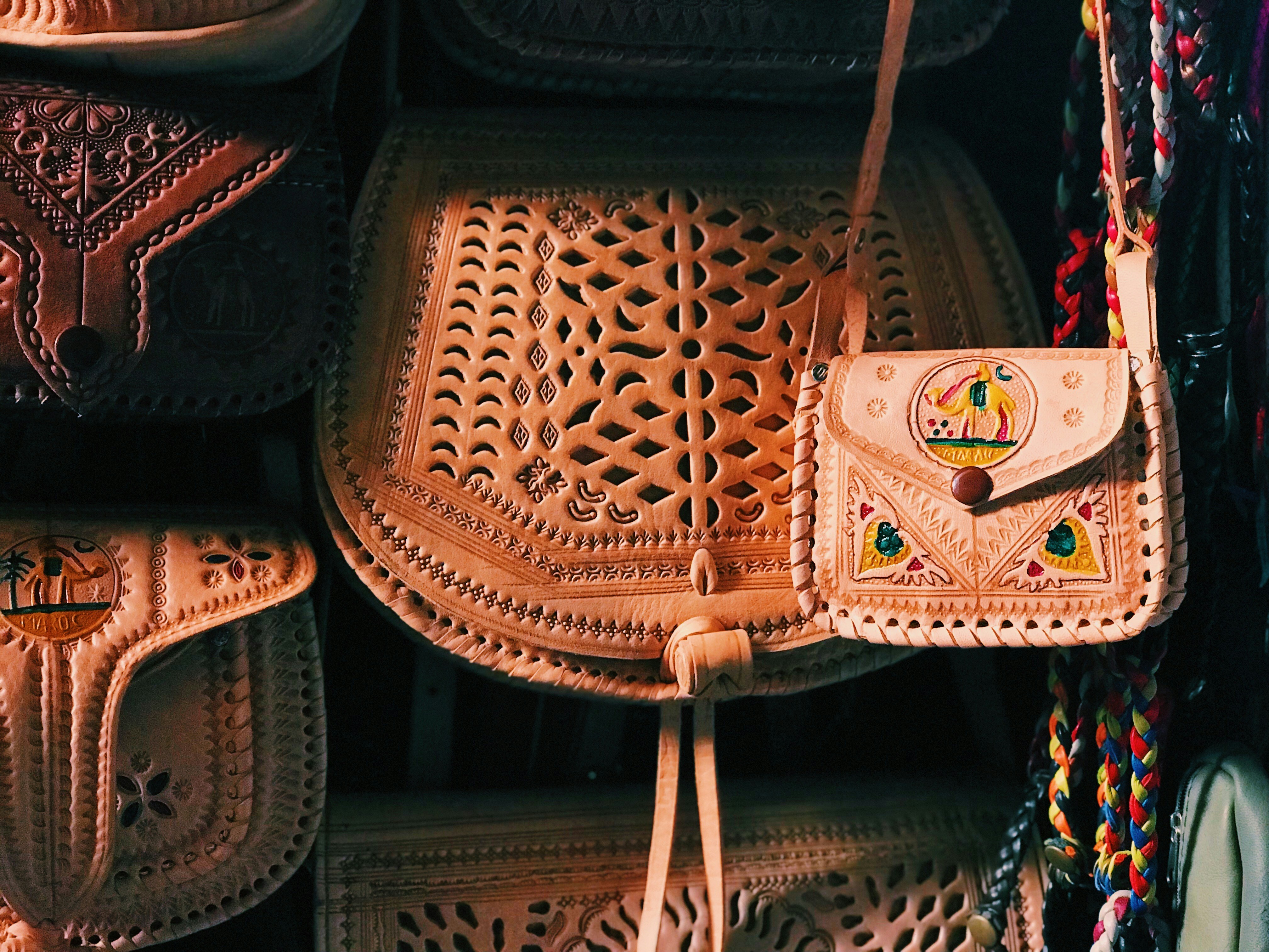 A bunch of purses that are on display