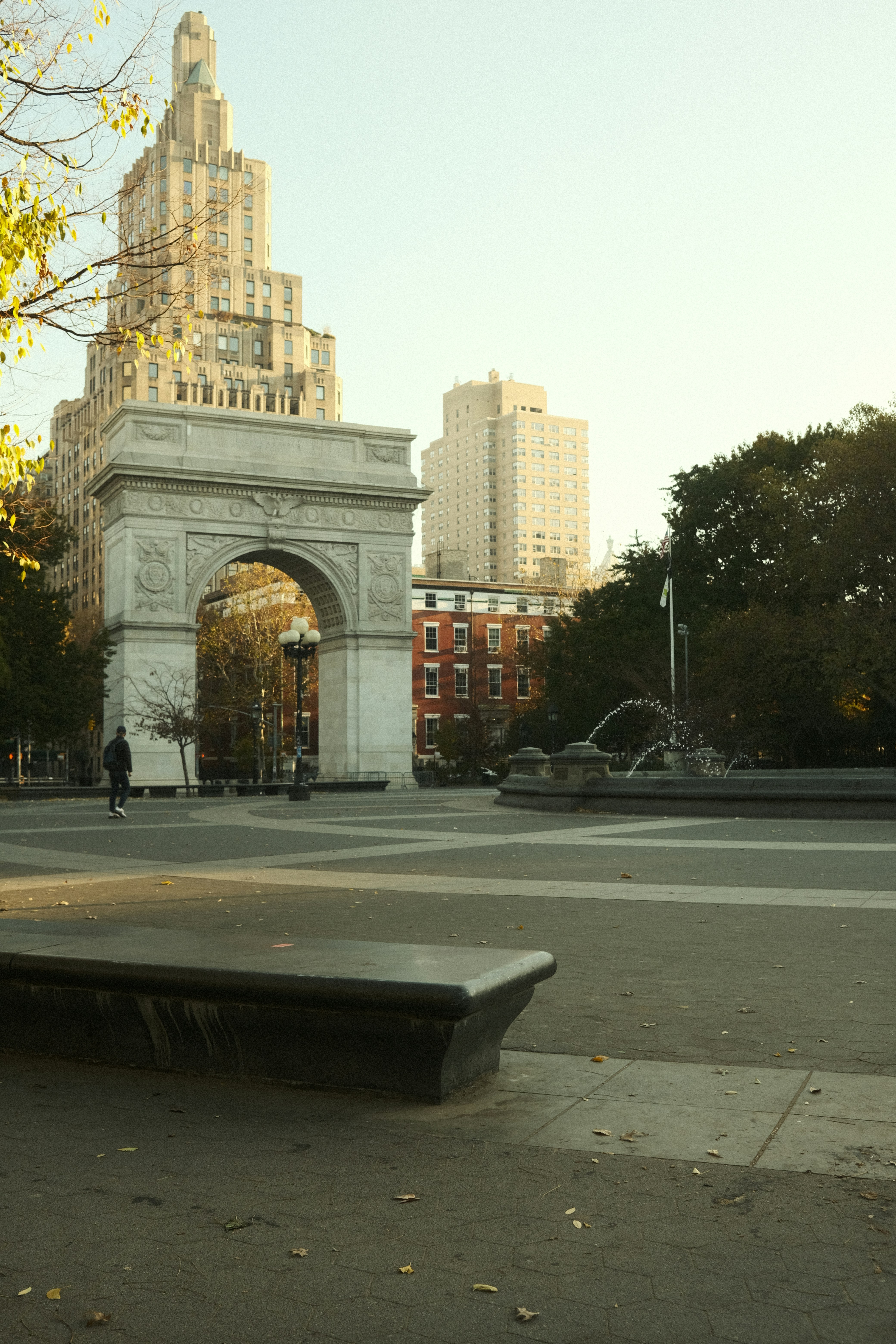 A bench sitting in the middle of a park