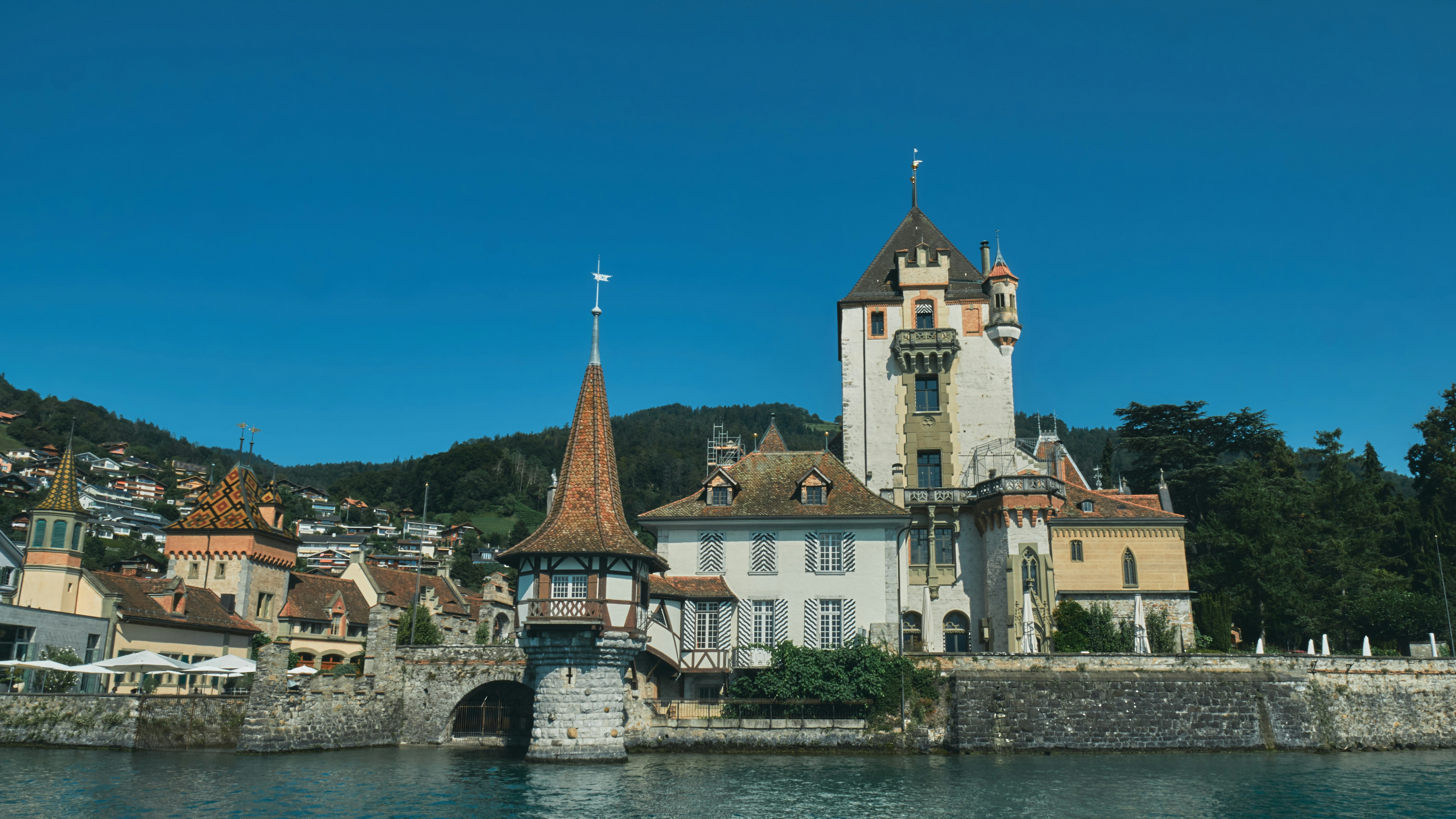 A large building sitting on top of a body of water
