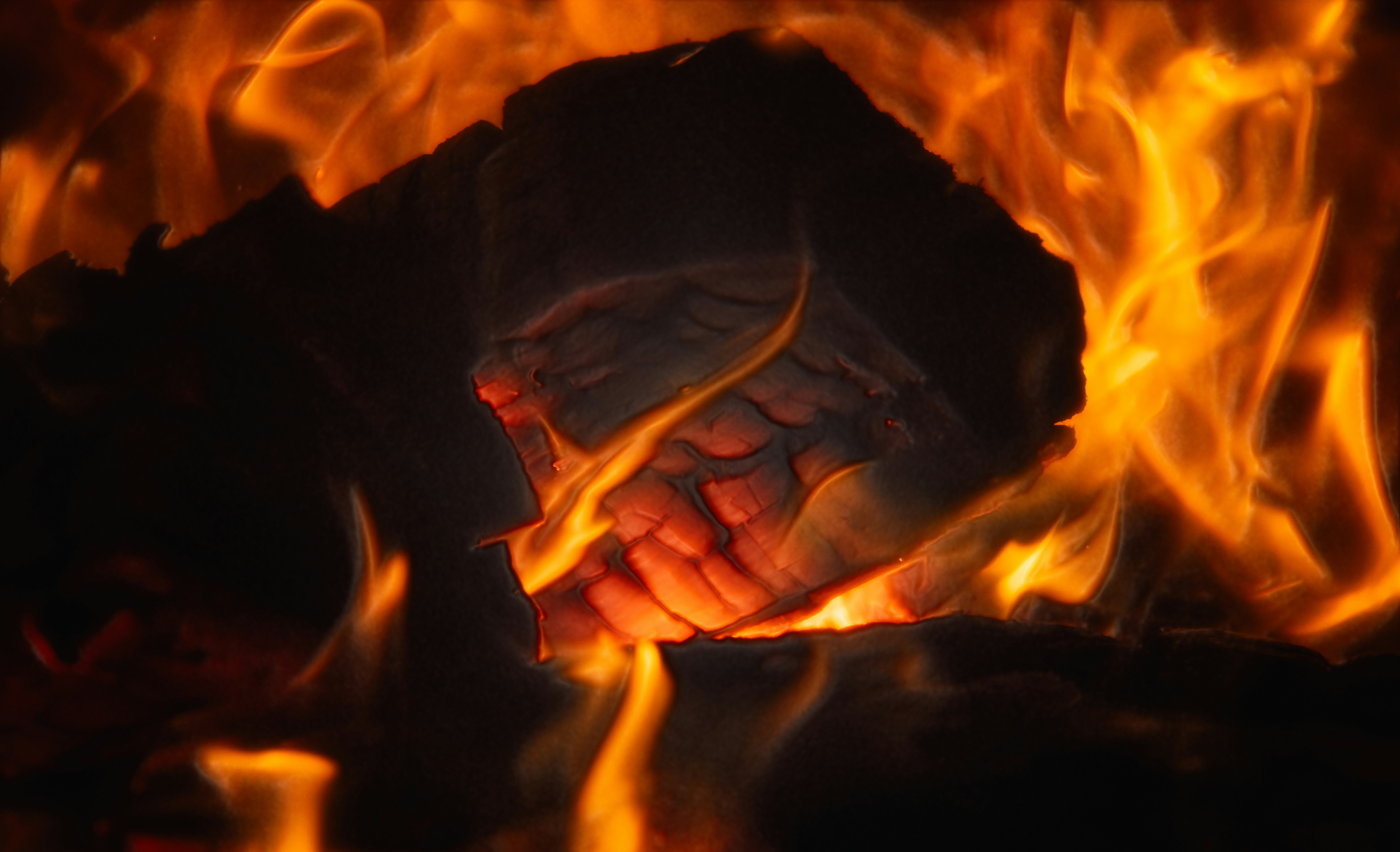 A close up of a fire in a fireplace