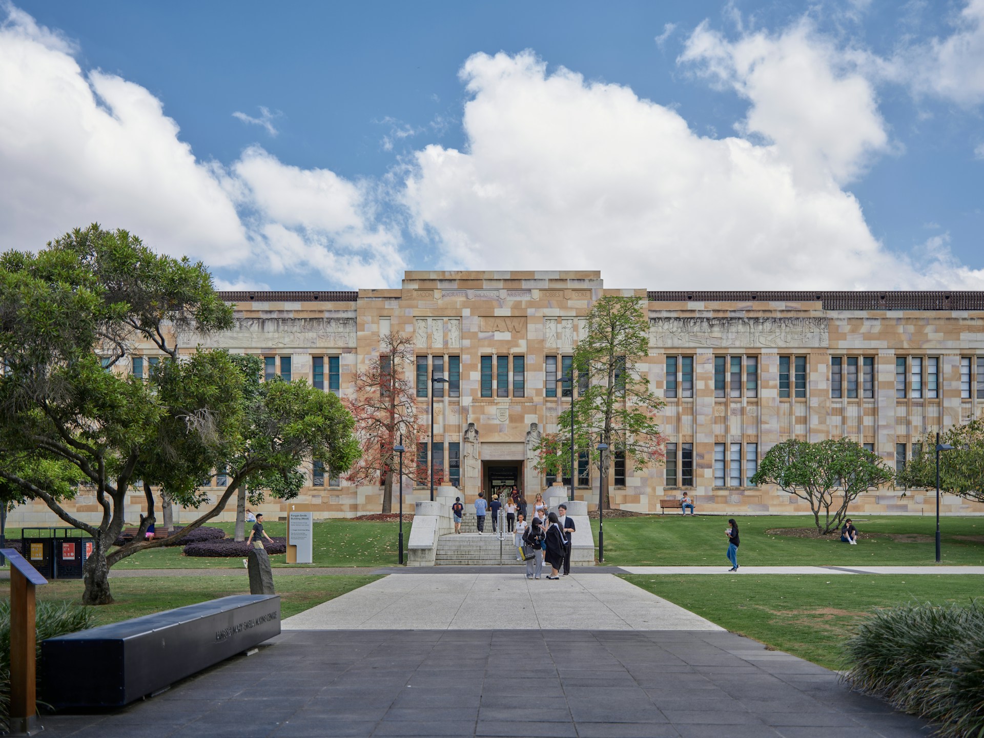 A group of people standing in front of a building