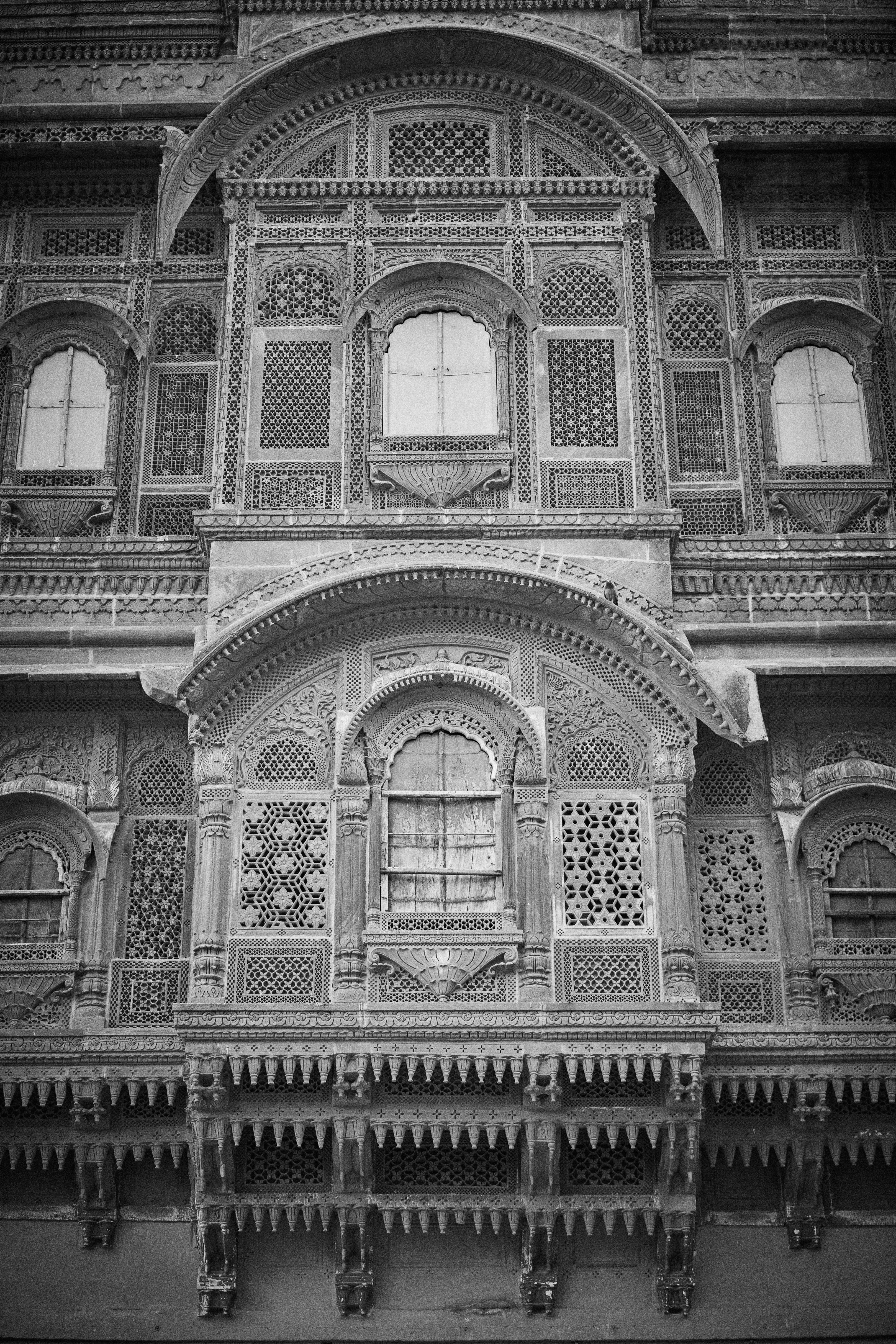 An old building with many windows and balconies
