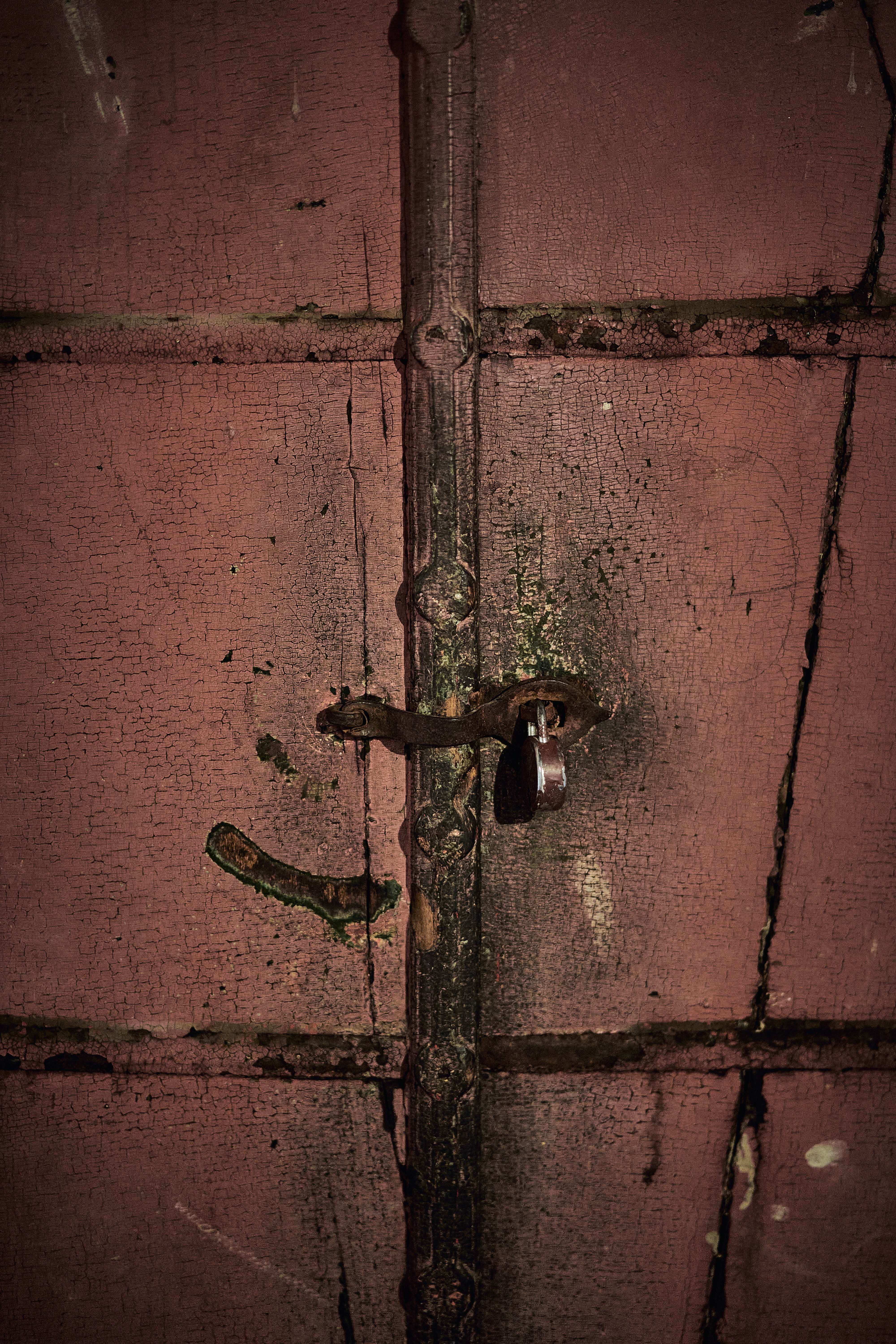 A door with a lock on it in a room