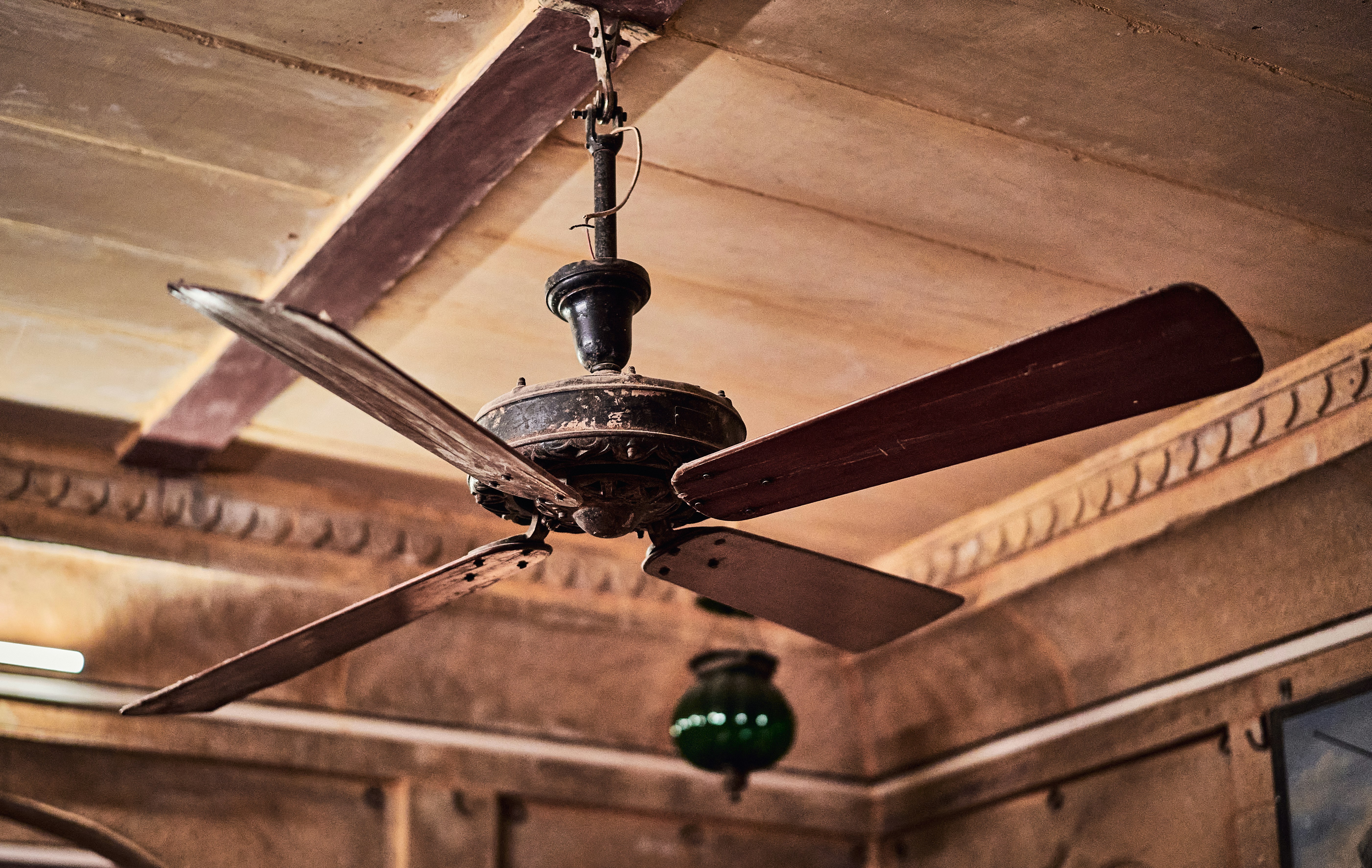 A ceiling fan is hanging from the ceiling
