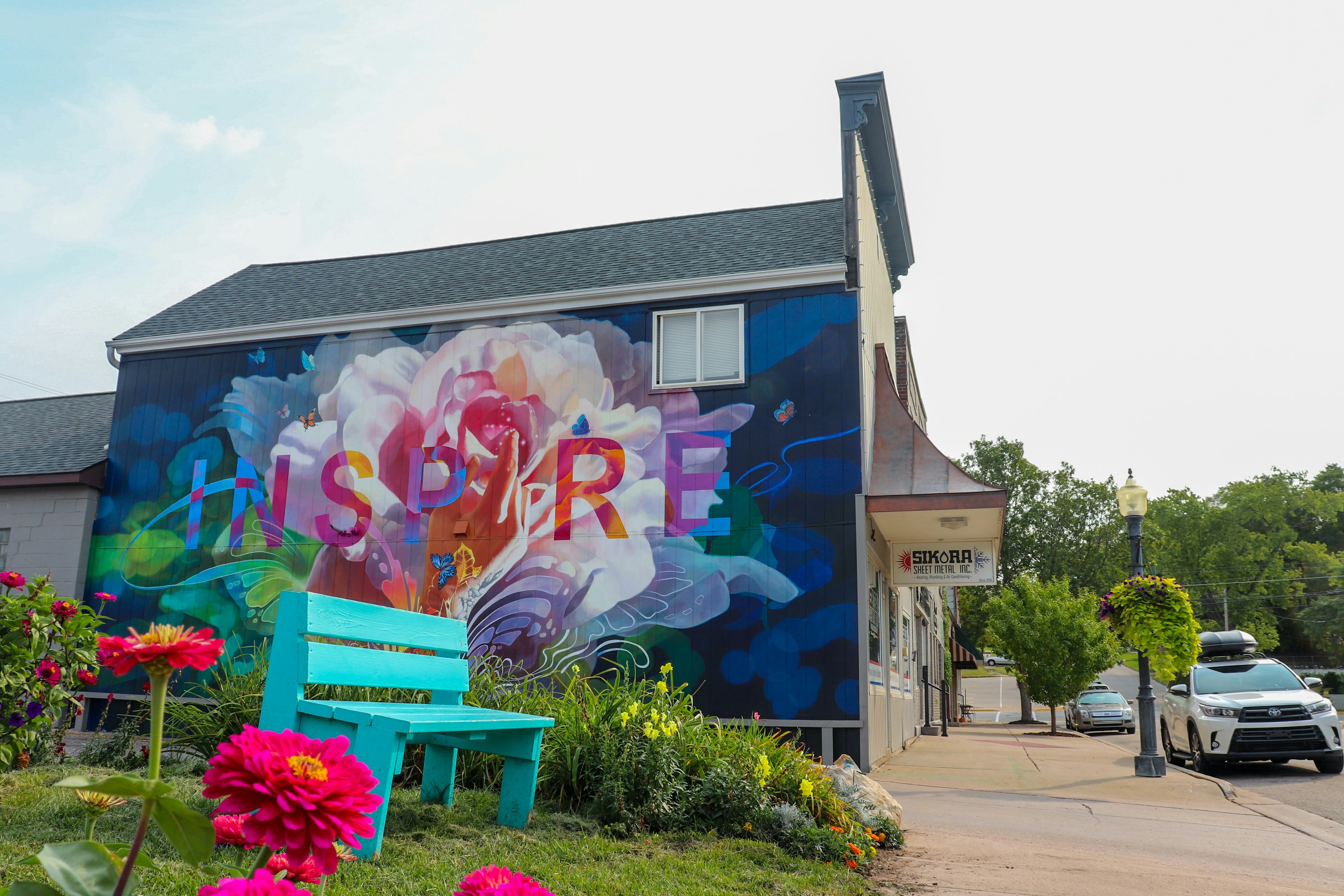 A colorful mural on the side of a building