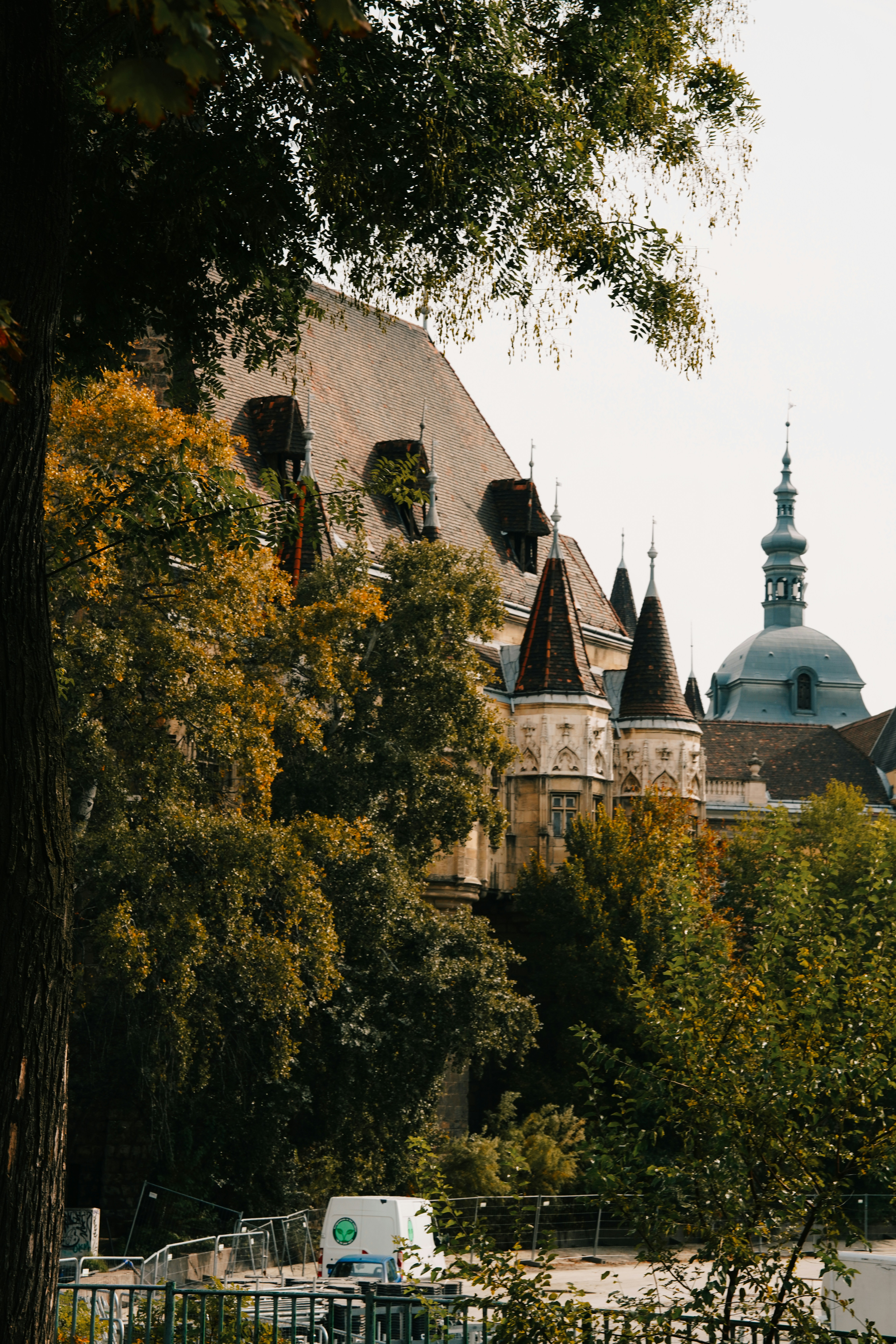 A large building with a clock tower on top of it photo – Free Building ...