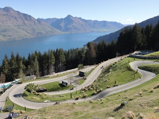 A scenic view of a winding road in the mountains