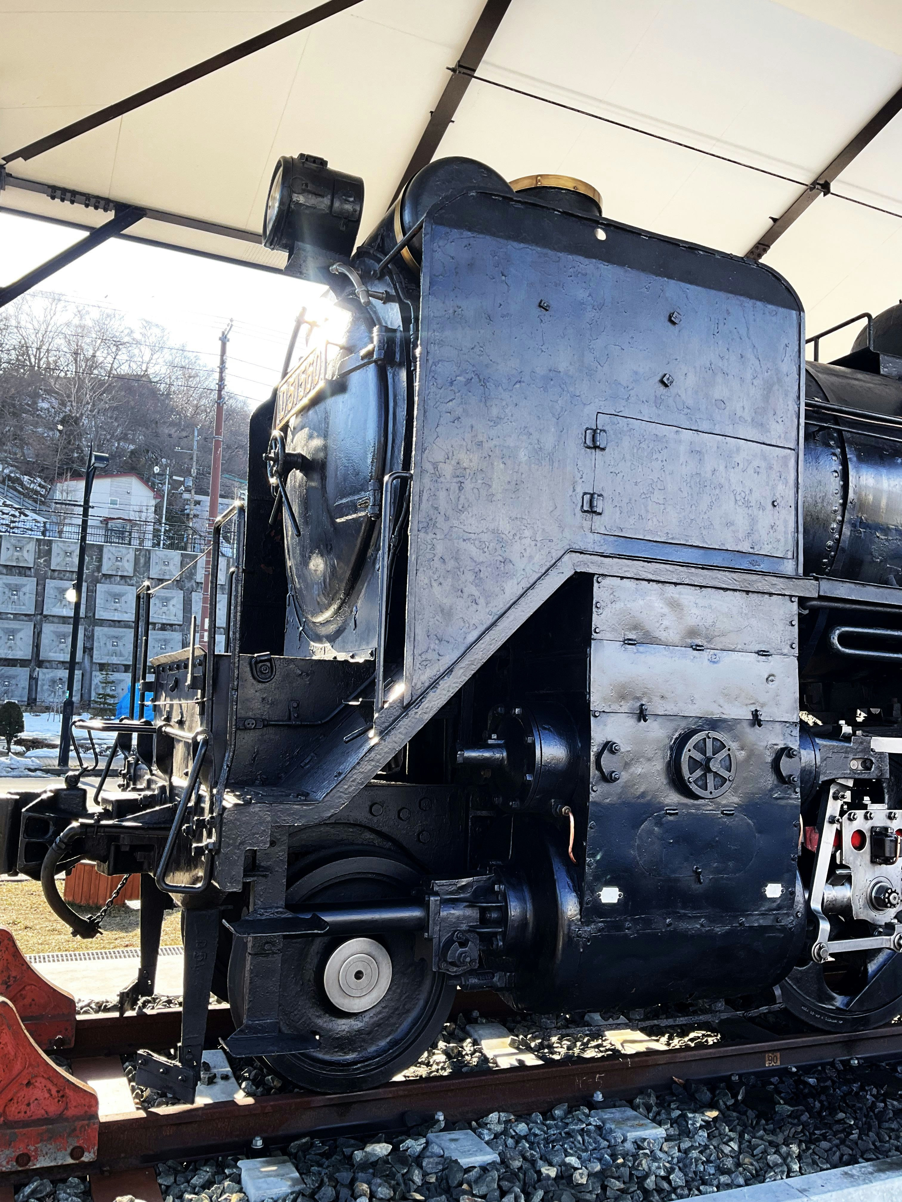 A black train engine sitting on a train track photo – Free Steam train ...
