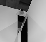 A black and white photo of a mirror