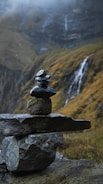 A stack of rocks sitting on top of a mountain