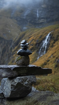 A stack of rocks sitting on top of a mountain