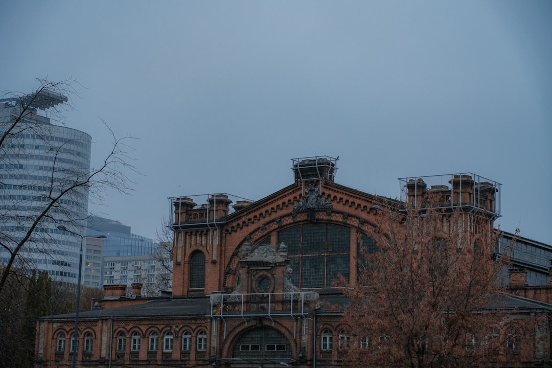 An old building with a clock tower in the background,